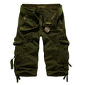 Men's green cargo shorts with multiple pockets and belt, casual outdoor style.