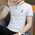 White short-sleeve polo shirt with black feather embroidery and striped collar