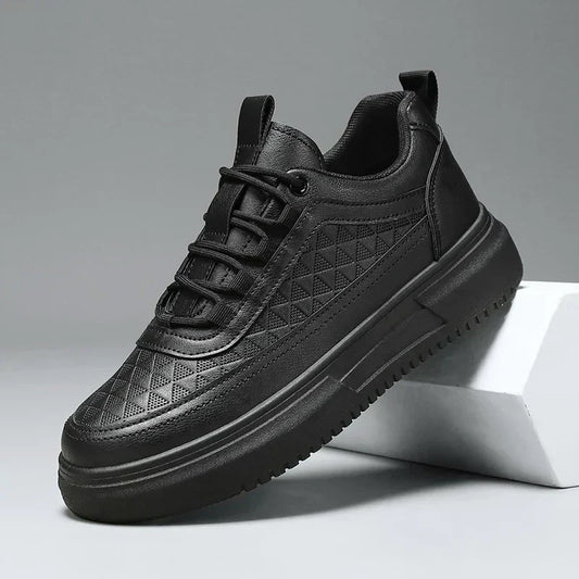 Black men's sneaker with textured geometric pattern and thick sole, side view