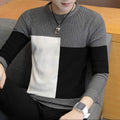 Men's color block knit sweater with gray, black, and white geometric pattern